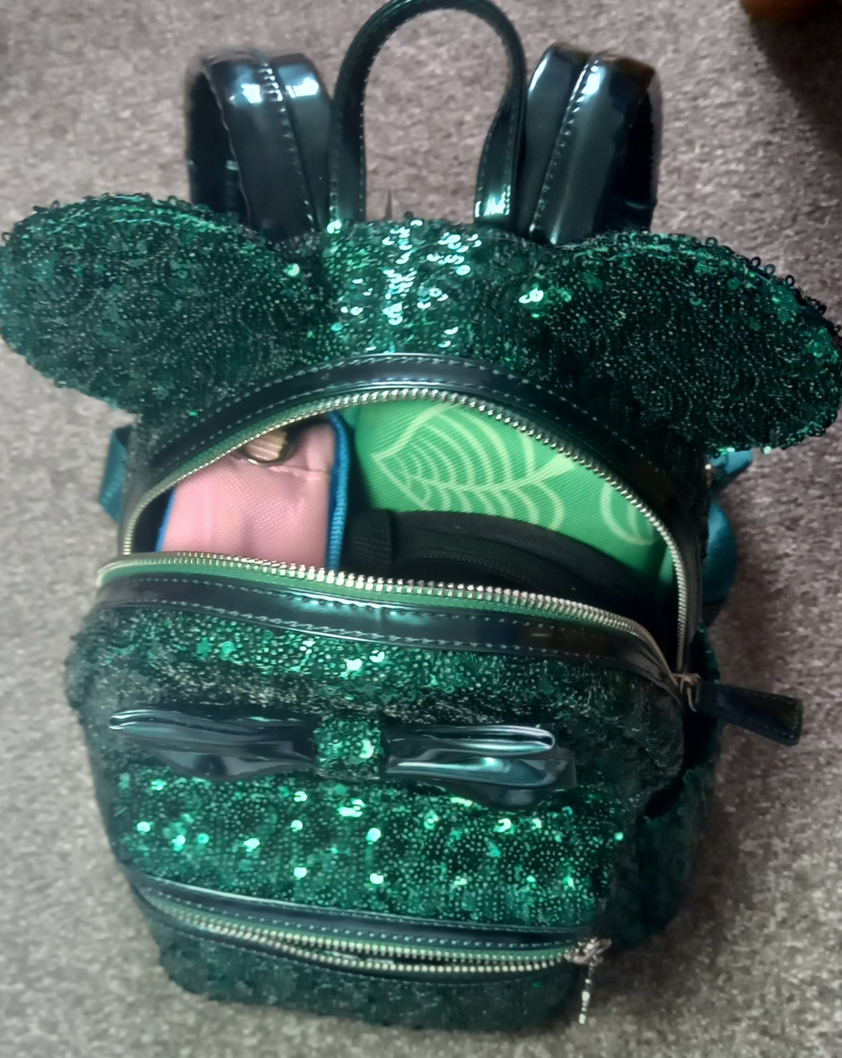 Image for Review: Loungefly Disney Minnie Mouse Green Sequin Mini Backpack